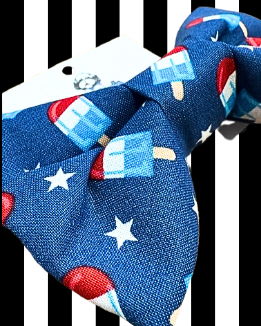 patriotic red white blue rocket pop dog bow tie close-up